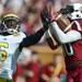 Michigan defensive back Raymon Taylor looks on as South Carolina wide receiver Damiere Bryd makes a touchdown catch in the end zone during the first quarter of the Outback Bowl at Raymond James Stadium in Tampa, Fla. on Tuesday, Jan. 1. Melanie Maxwell I AnnArbor.com